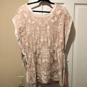 Very pretty lace top. NWT